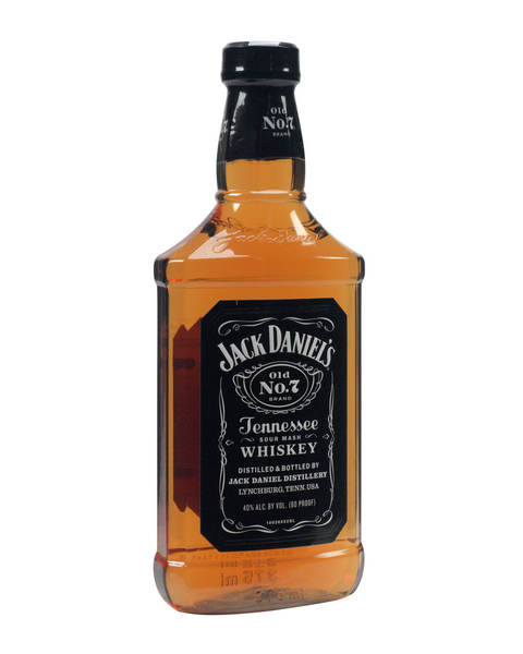 Jack Daniel's whiskey bottle and glass. Jack Daniel's is a brand
